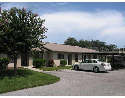 Exterior Front - Carport infront of 6045 and extra guest parking next to that.