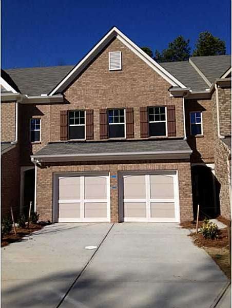 Exterior Front. BRICK EXTERIOR FRONT, INTERIOR UNI
