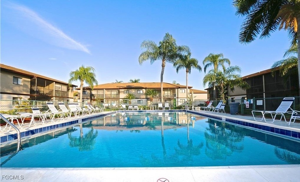Community pool featuring a patio area