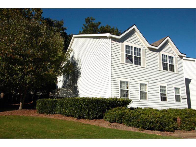 Top floor end unit on a corner lot. Double hung wi