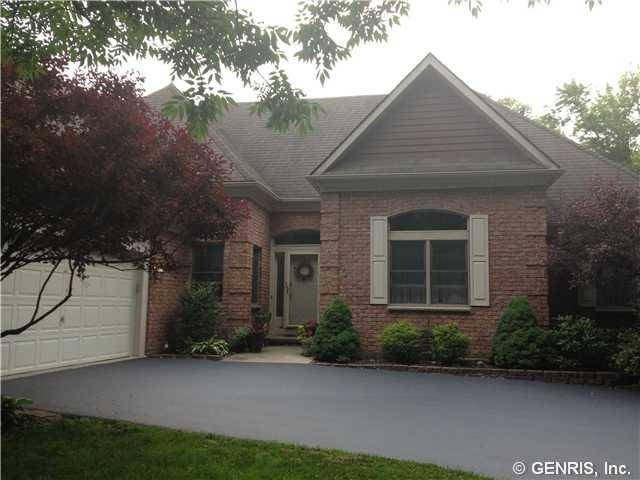 Exterior Front. Stately Brick Ranch on Golf Course