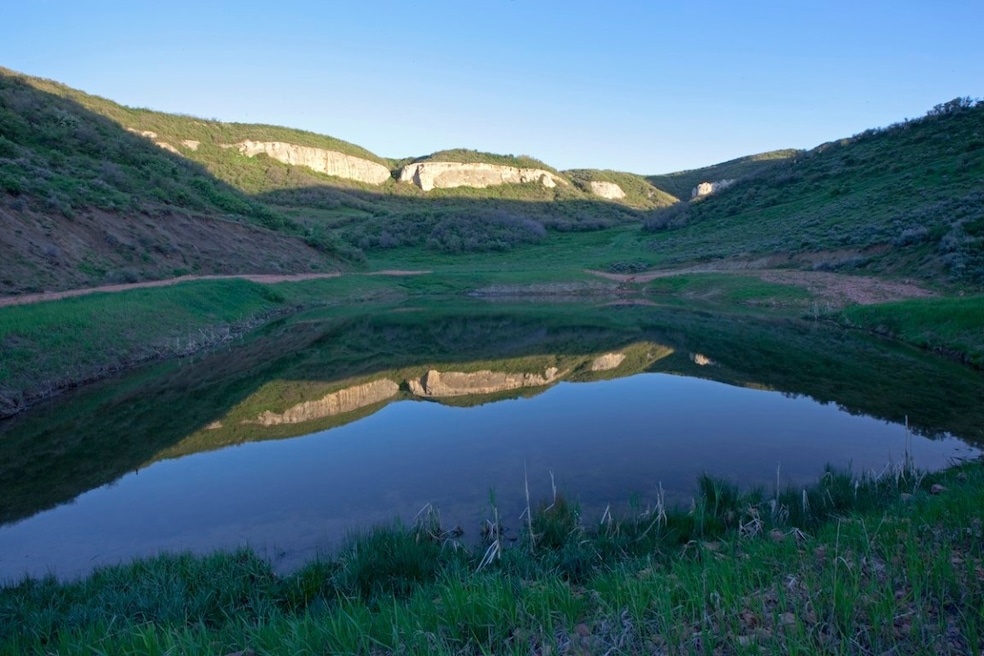 Mountain view featuring a water view