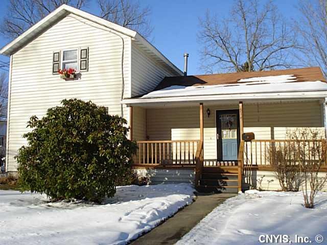 Exterior Front. Lovely corner home features garden