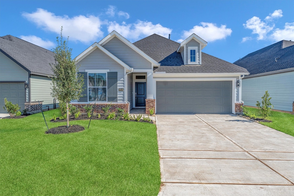 Welcome HOME to 16931 Tulip Row Lane!