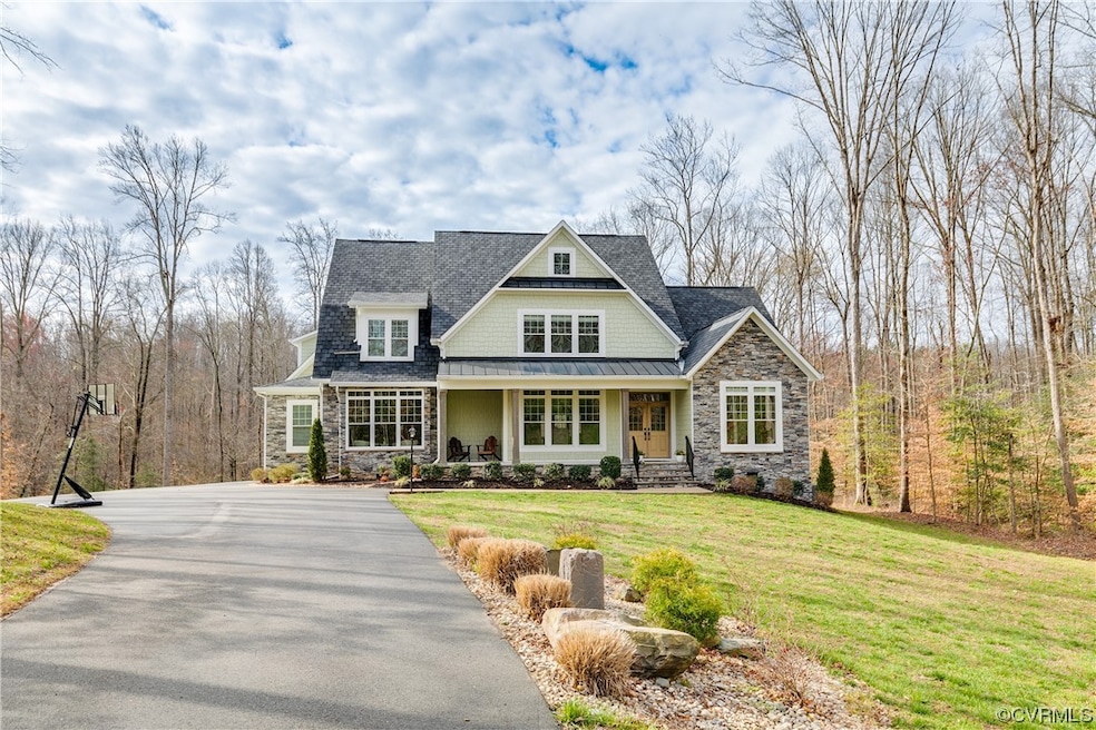 Entirely paved driveway, with stamped concrete by the mailbox