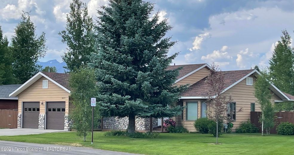 3077 Rangeview Drive with Mountains
