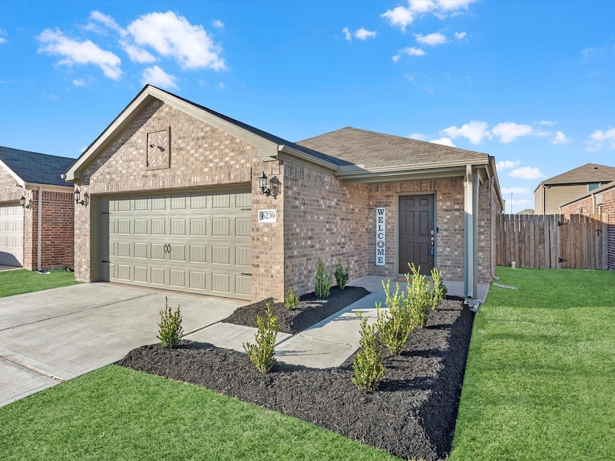 This inviting home is ready for you! Fresh Landscaping enhances the curb appeal.