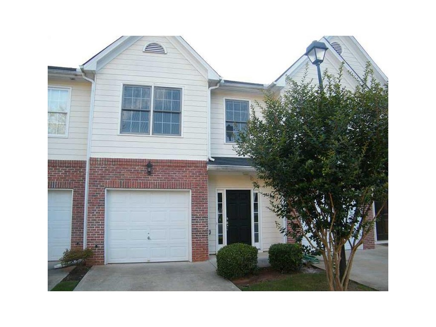 Exterior Front. A BRICK/HARDIPLANK TOWNHOUSE BUILT