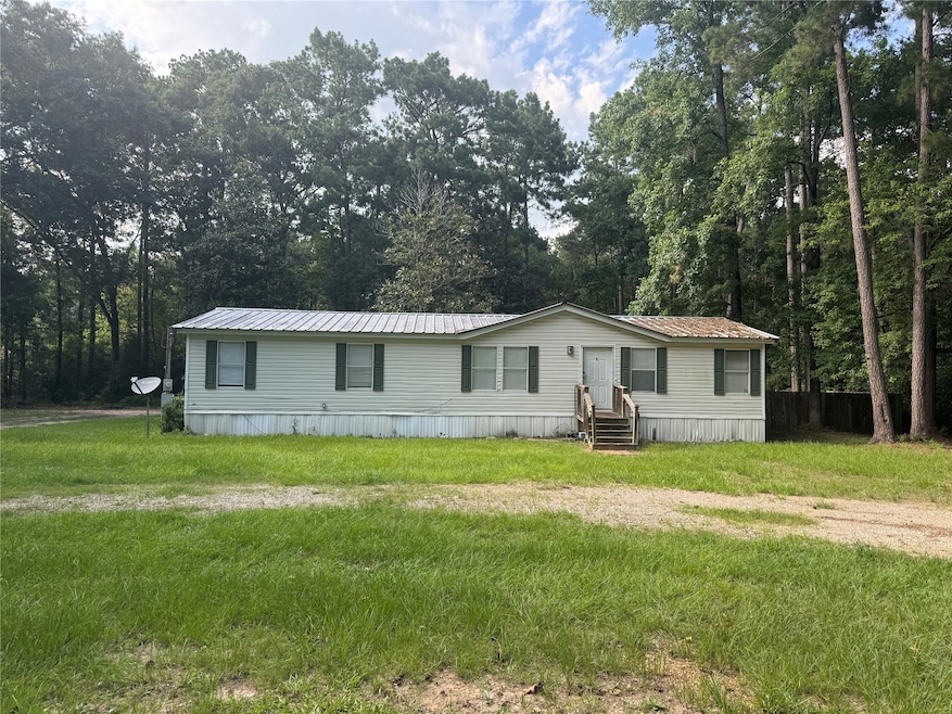 181 County Road 3793, Cleveland, TX 77328 - photo 1