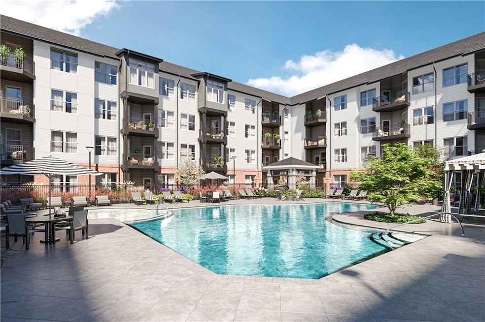 Community pool featuring a patio area