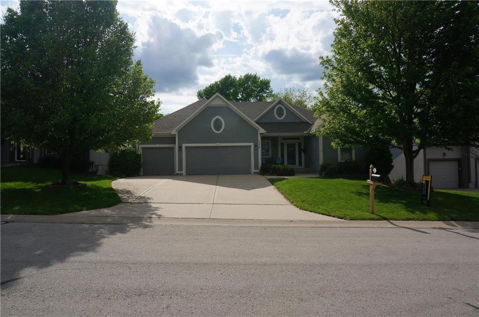 Beautiful Reverse 1.5 story in Shawnee....