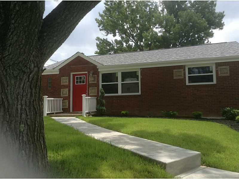 Exterior Front. New roof, windows, soffit & fascia