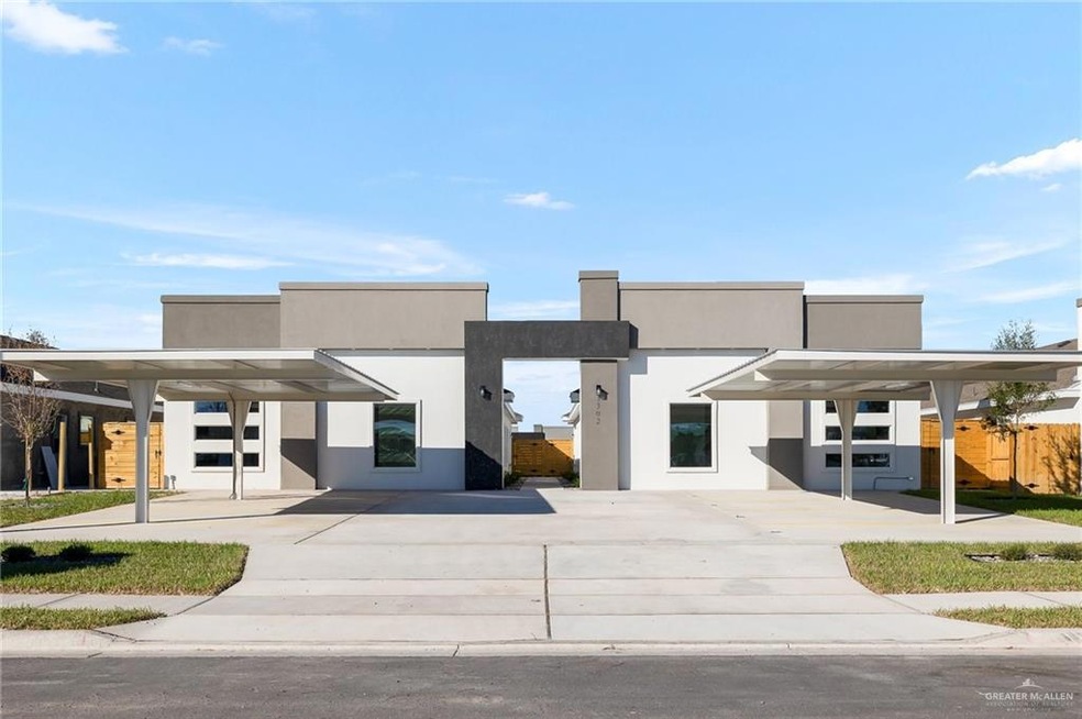 View of front facade with a carport