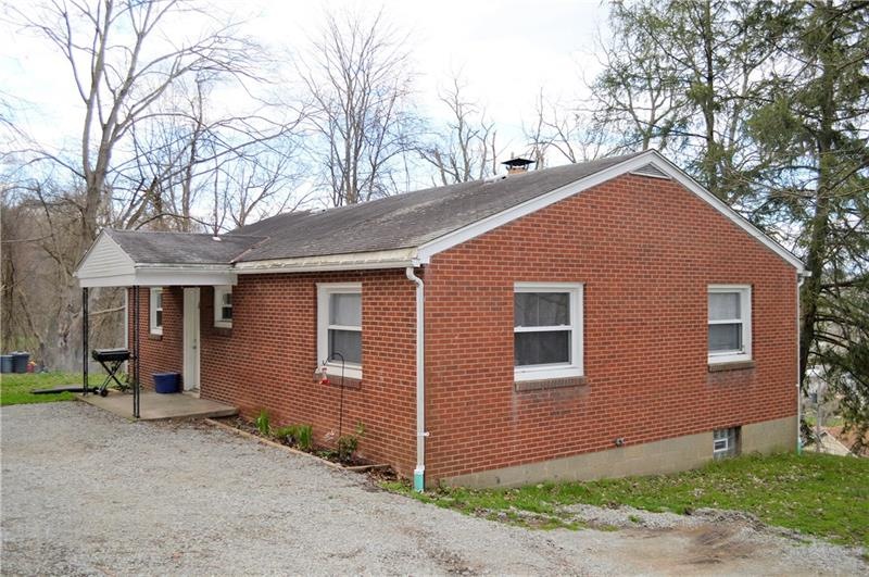 All brick ranch with one floor living at a price y