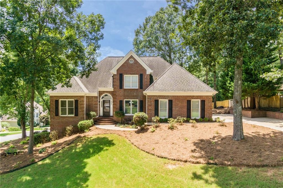 GORGEOUS THREE SIDED BRICK HOME IN LORING SQUARE W