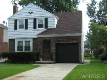 Exterior Front Before the snow!  Bushes have also 