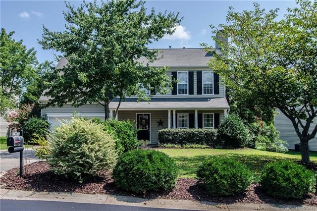 View from the curb of this beautiful two story in the desirable Bradfield farms neighborhood.