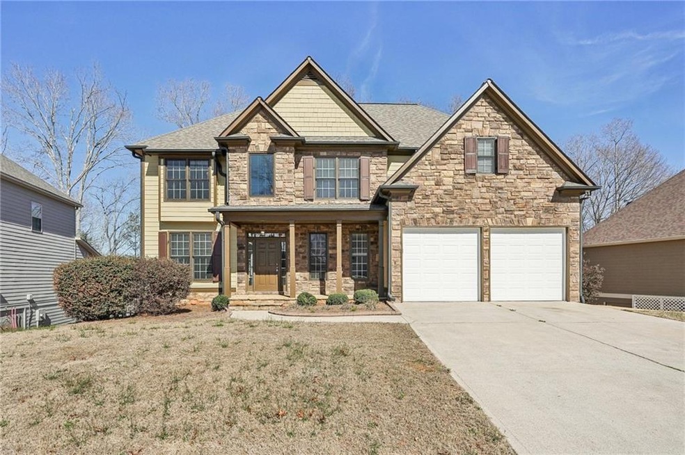 Craftsman inspired home featuring a porch, stone s
