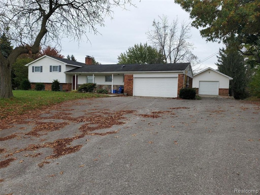 4BR, 1 full, 2 half bath attached garage and 2 sto