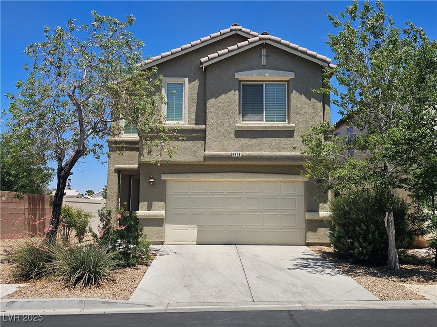View of front of property featuring stucco siding,
