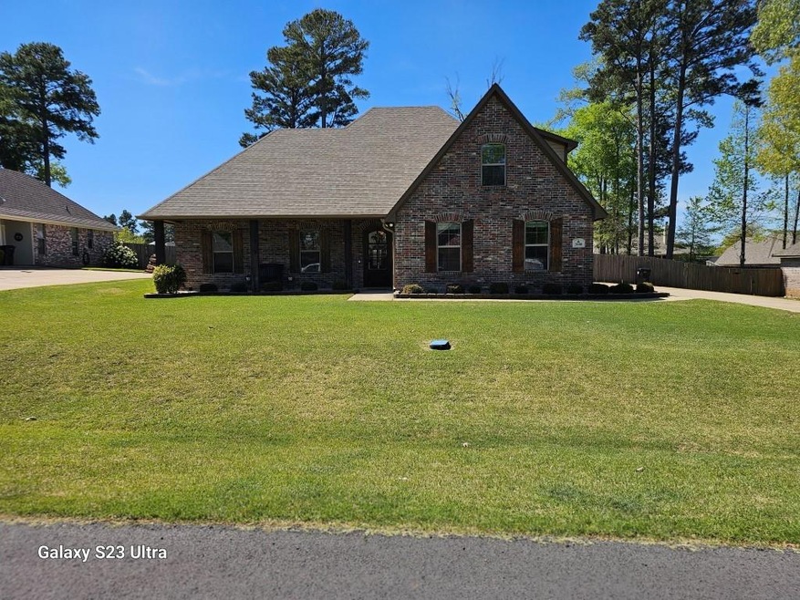 View of front of house with a front lawn