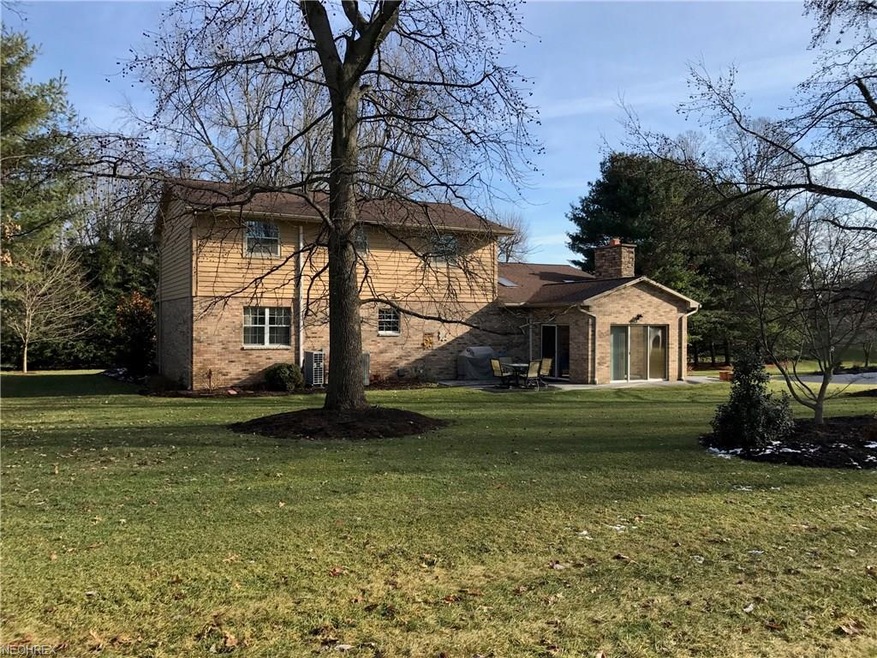 Rear of House - Sunroom and patio