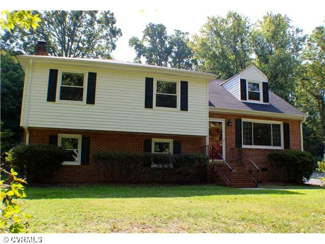 Exterior Front - Home is nicely situated atop a hi