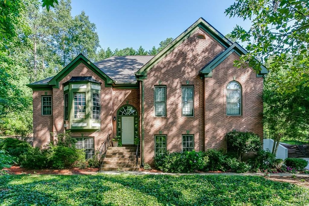 Beautiful split foyer home on private one acre woo
