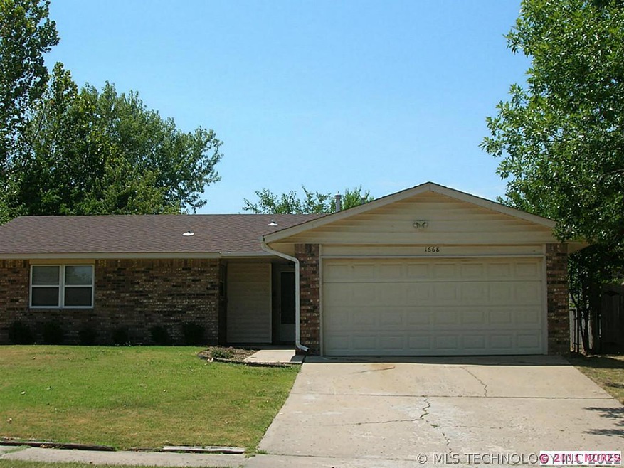 Immaculately kept full brick home with newer roof.