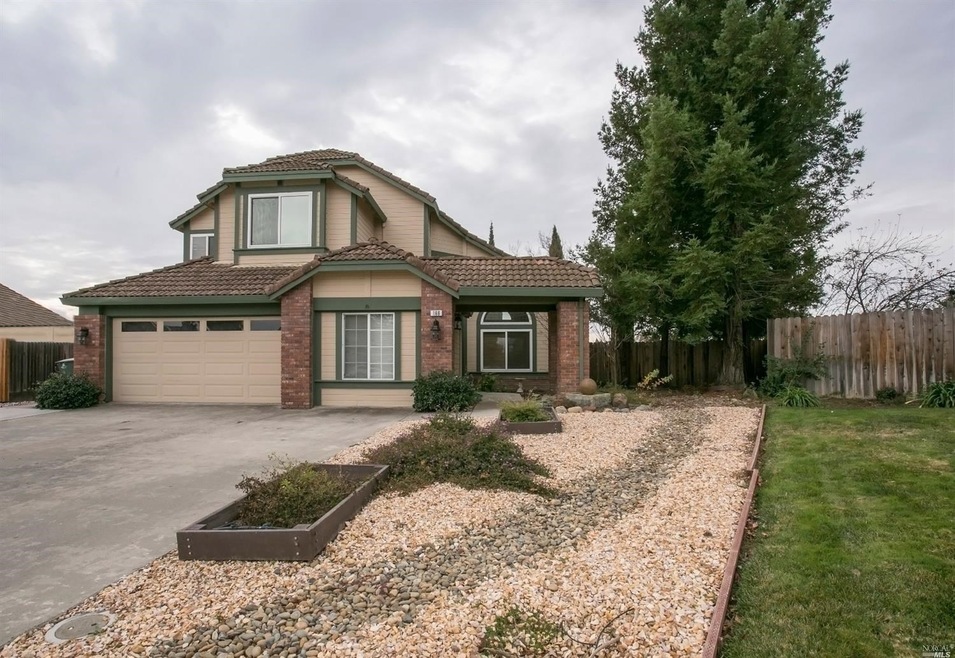 Large driveway with RV parking possibilities. 2 car Garage with Bonus room!