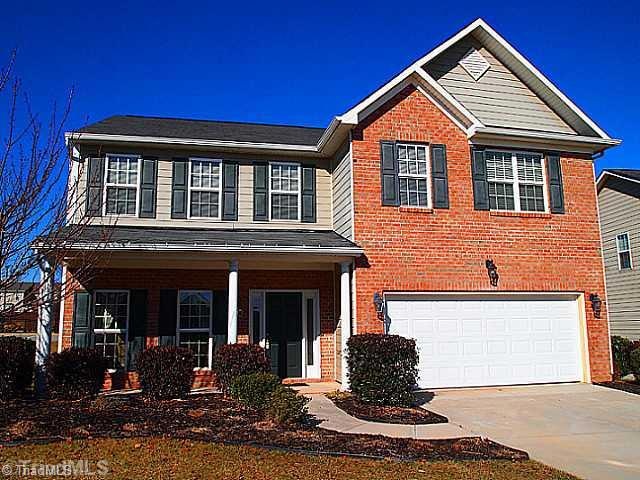 Exterior Front. Wonderful brand new two car garage.  Brick and vinyl home!  Waiting for an offer!