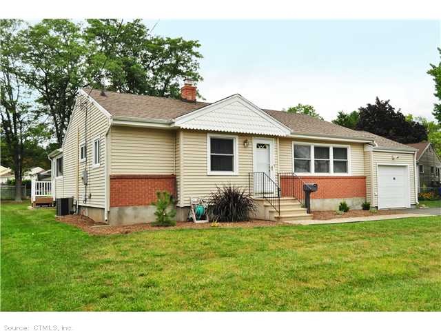 Exterior Front. Charming Brick-Front Easy-Care Ran