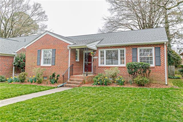 Welcome Home to 4719 W. Grace Street! Charming bri