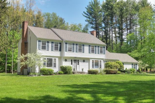 Picture perfect setting in Greenfield Hill, tucked