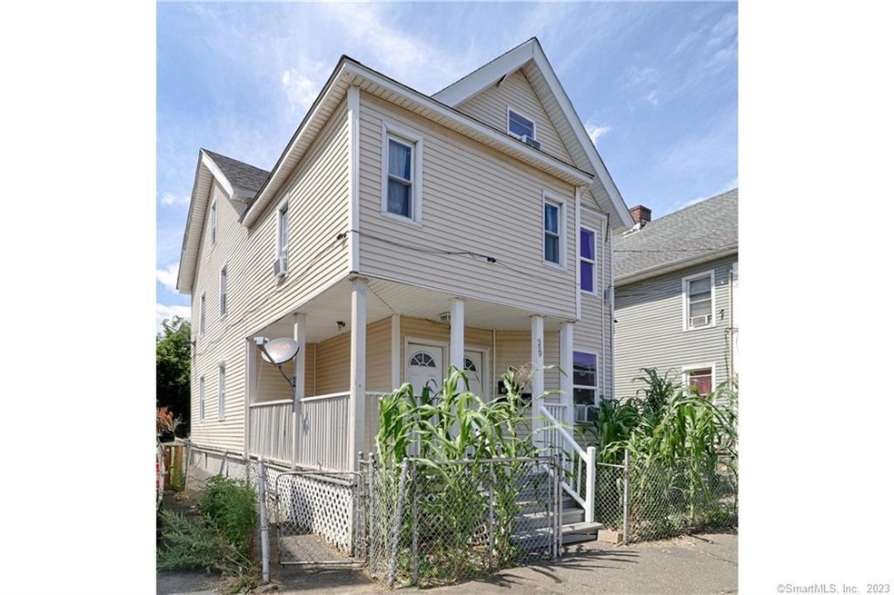 Updated 3-Family Home, fully rented.