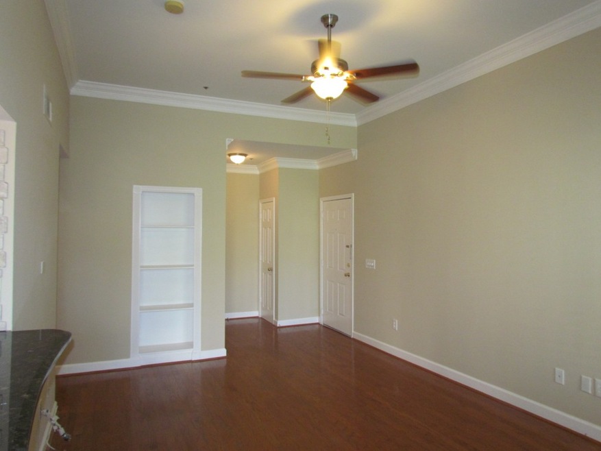 A Gracious Foyer Opens to Main Living Area with 12