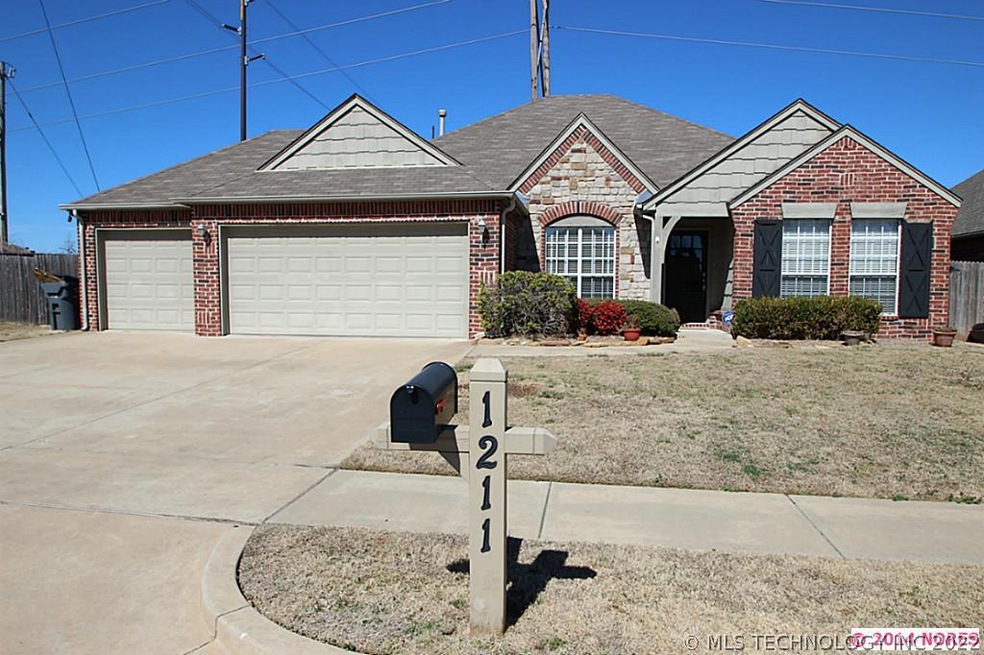 This beautiful brick one story is located at 1211