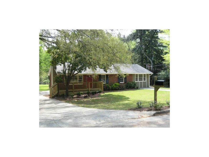 Exterior Front. Adorable Mid-Century Ranch in an e
