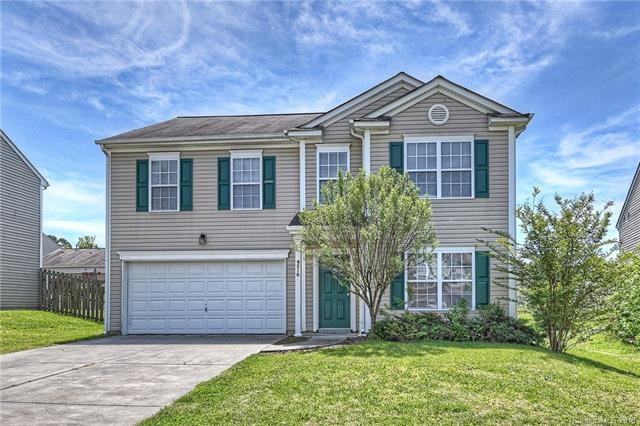 Gorgeous 4 bedroom home well landscaped yard sits 