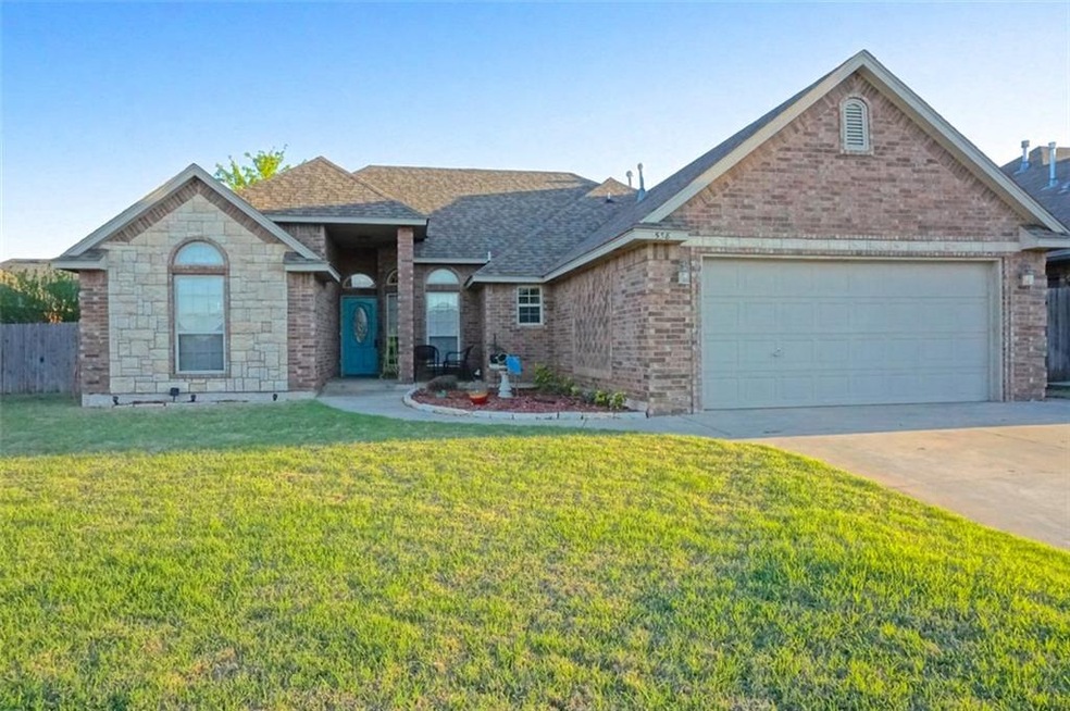 Beautiful Brick and Stone Construction. Garage has