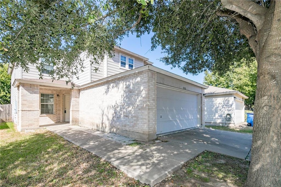 View of front of property with brick siding