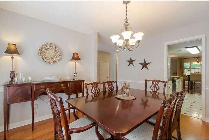 Dining Room. Well lit dining room with plantation 