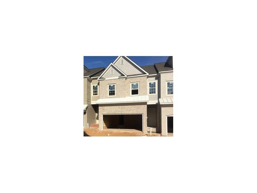 Homesite 57 is an interior brick unit with covered