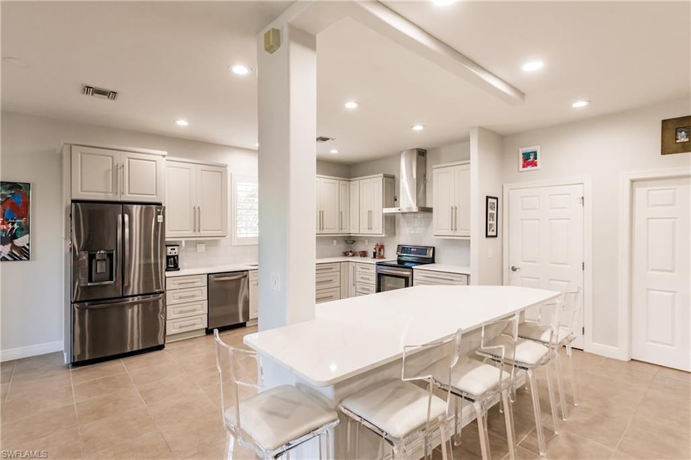 12843 Carrington Cir unit 102, Naples, FL 34105 - photo 1