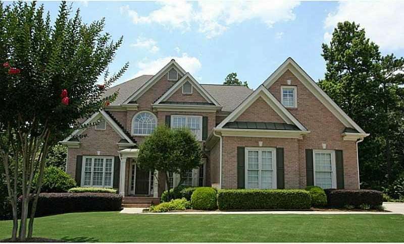 Exterior Front. Extremely well-manicured brick bea