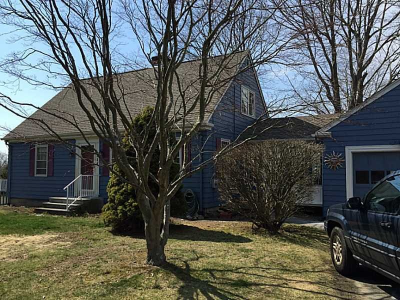 Exterior Front. 3 or 4 bedroom Cape with attached