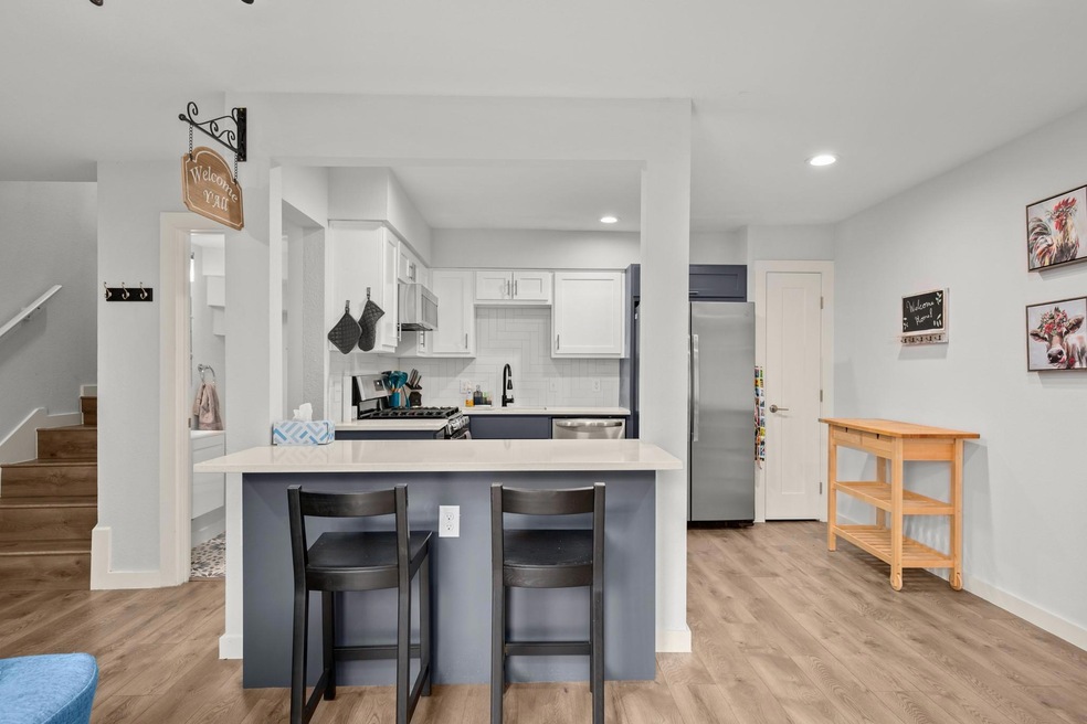 Kitchen featuring appliances with stainless steel