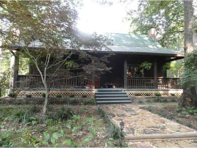 Exterior Front. Front view of log house
