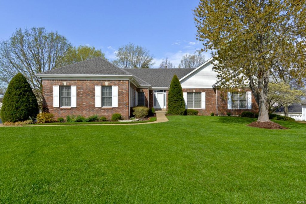 Stately brick front, newer landscaping, in ground 