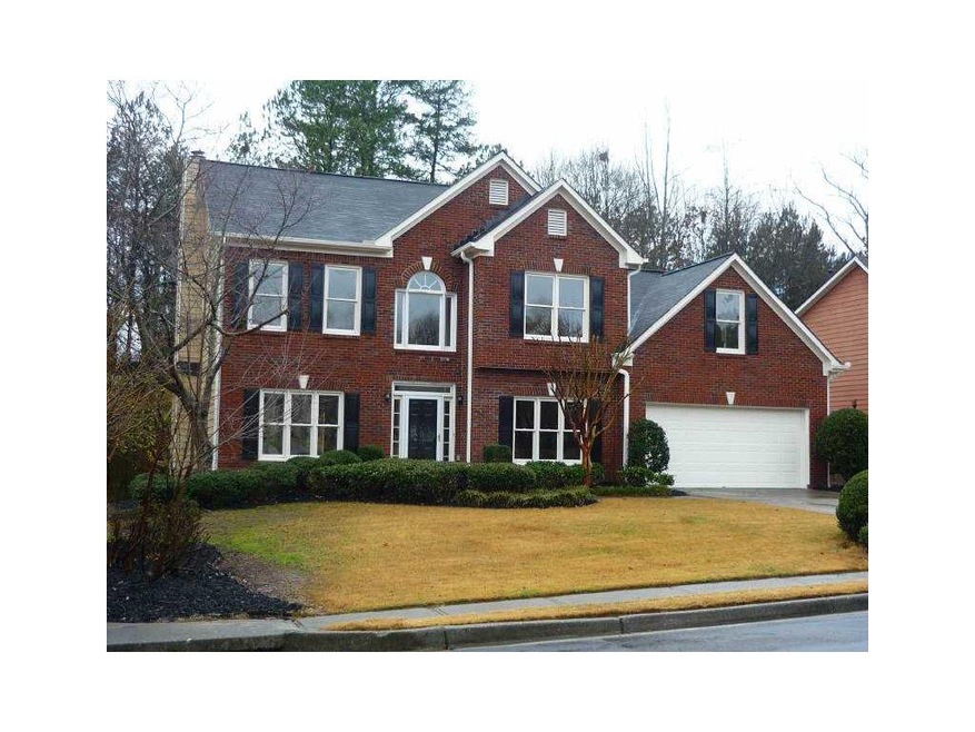 Exterior Front. Brick Front with Cement Siding